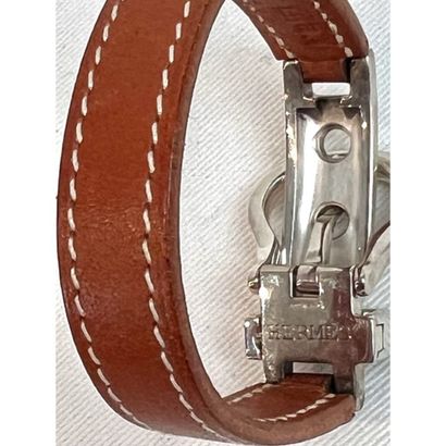 HERMES Paris. Fawn leather and white saddle-stitched...