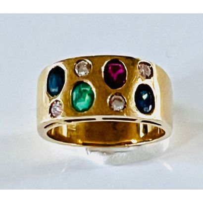 BAGUE bandeau en or jaune 750°/°° serti clos...