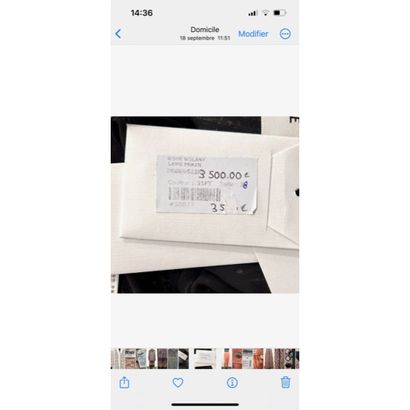 CELINE. Robe longue à volant en soie imprimée...