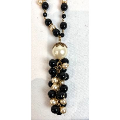 CHANEL. 5-row necklace in gilded metal interspersed...