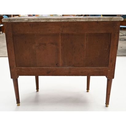 A LOUIS XVI half-moon-shaped COMMODE with...