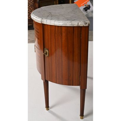 A LOUIS XVI half-moon-shaped COMMODE with...