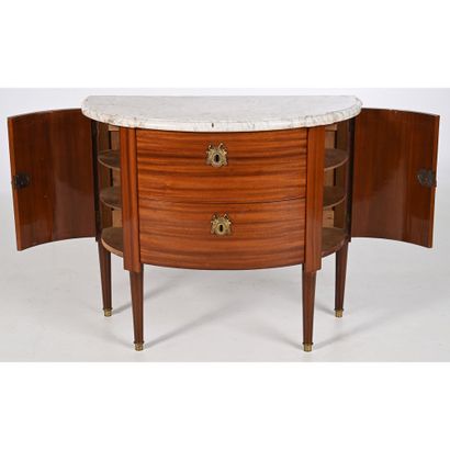 A LOUIS XVI half-moon-shaped COMMODE with...