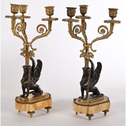 PAIR OF CANDELABRES IN THE EMPIRE STYLE representing...