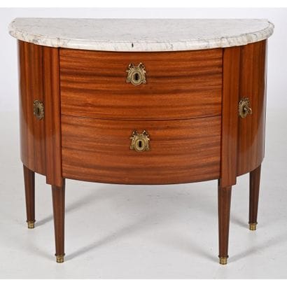 A LOUIS XVI half-moon-shaped COMMODE with...