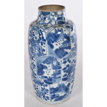 CHINA. A tapered vase decorated in compartments...
