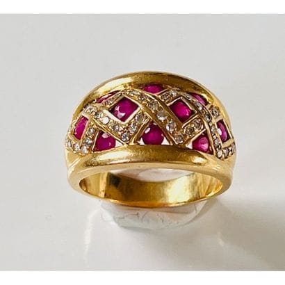 BAGUE jonc en or jaune 750°/°° serti clos...