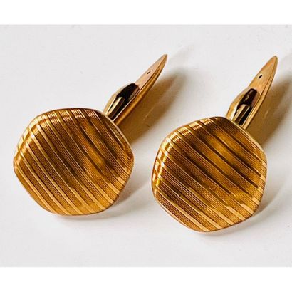 PAIRE DE BOUTONS DE MANCHETTE en or jaune...