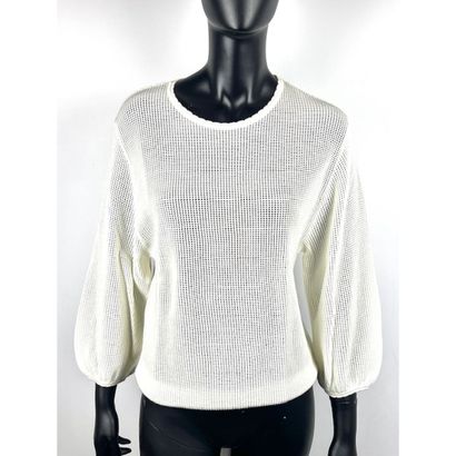 MOLLI. Pull en tricoté de pure laine vierge...