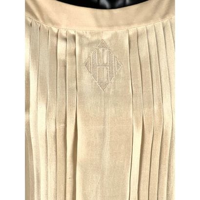 HERMES. Robe sans manche en plissé permanent...
