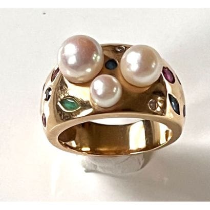 BAGUE jonc en or jaune 750°/°° ornée de 3...