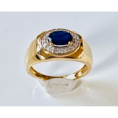 BAGUE jonc en or jaune 750°/°° ornée d’un...