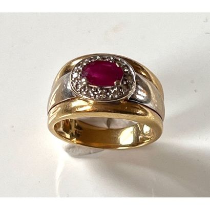 BAGUE jonc 2 ors 750°/°° ornée d’un rubis...