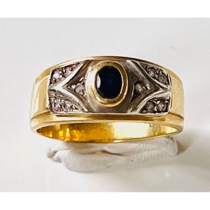 BAGUE jonc en or jaune 750°/°° serti clos...