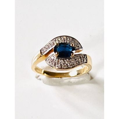 BAGUE croisée en or jaune 750°/°° ornée d’un...
