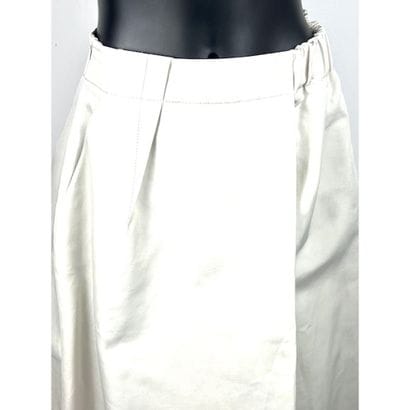 DICE KAYEK. Jupe évasée à plis plats en coton...