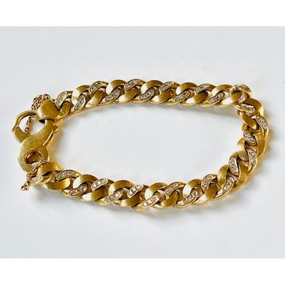BRACELET gourmette en or jaune. Certains...