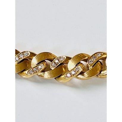 BRACELET gourmette en or jaune. Certains...