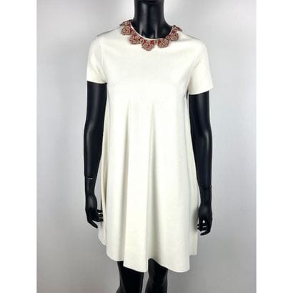 VALENTINO. Robe courte évasée en viscose...