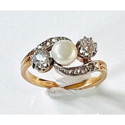 1900. BAGUE 2 ors 750°/°° ornée d’une perle...