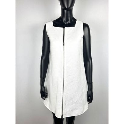 COURREGES. Robe droite sans manche en coton...