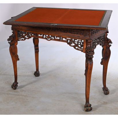 TABLE A JEUX en bois exotique à piètement...