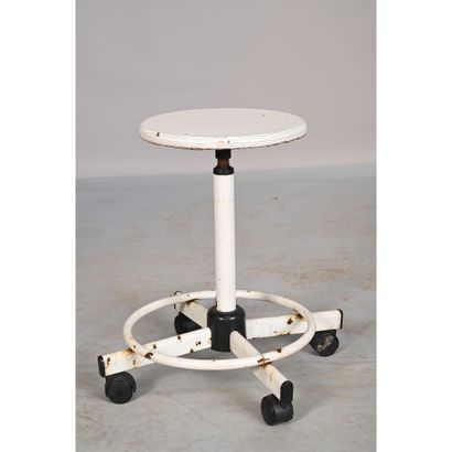 TABOURET à roulettes à assise circulaire...