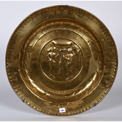Brass OFFERING PLAT decorated with a central,...