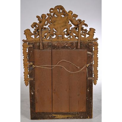 MIROIR LOUIS XIV à fronton à décor d’un profil...