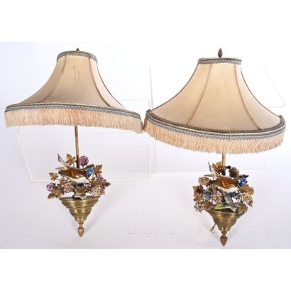 Pair of bronze and porcelain sconces depicting...