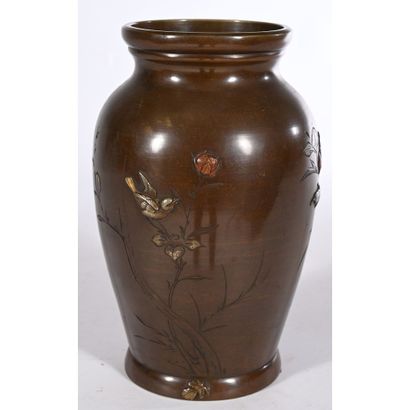 A bronze VASE with a gilded and silvered...