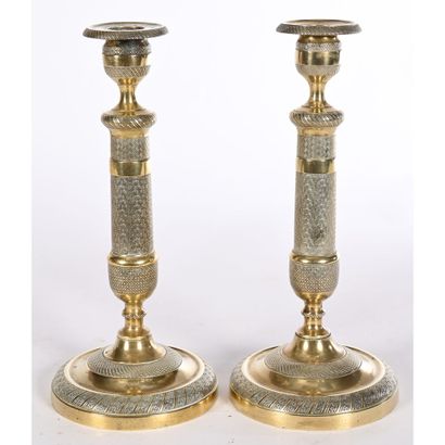PAIR OF EMPIRE CANDLES in bronze with a round...