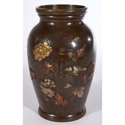 A bronze VASE with a gilded and silvered...