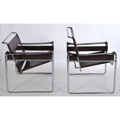 2 WASSILY ARMCHAIRS. Brown leather belt....