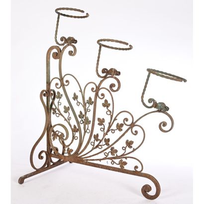 Iron PLANT HOLDER with floral design. Circa...