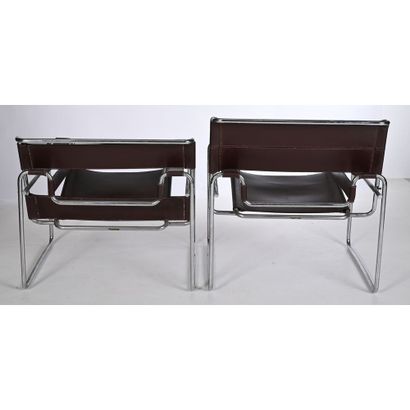 2 WASSILY ARMCHAIRS. Brown leather belt....