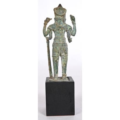 DIVINITY with four arms and staff in bronze....