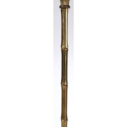 ADNET Jacques. LAMPADAIRE en bronze et laiton...