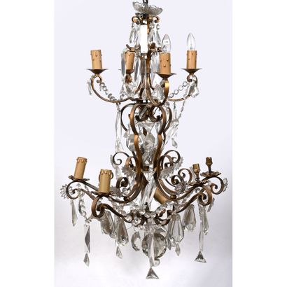 IMPORTANT LUSTRE en bronze à 9 lumières agrémentées...