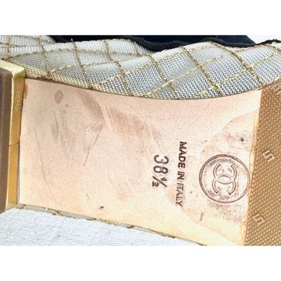 CHANEL. Pair of ballet flats in gold leather...