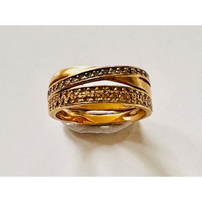 BAGUE en or jaune 750°/°° 3 anneaux croisés....