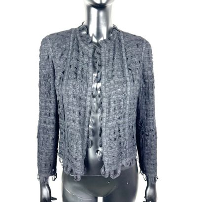 CHANEL. Evening jacket in black cotton lace...