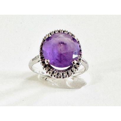RING in white gold 750°/°° set with an oval...