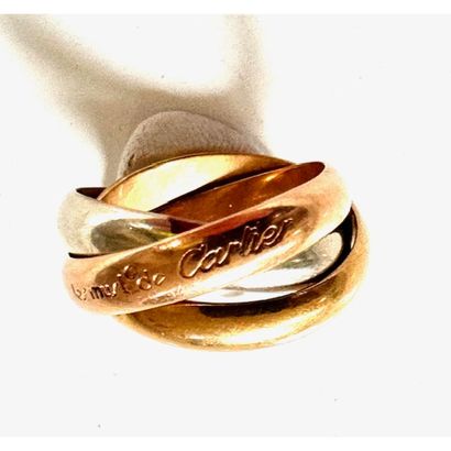 MUST DE CARTIER. 3 rings in 750°/°° gold....