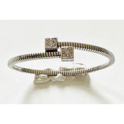 Rigid flexible BRACELET in white gold 750°/°°...