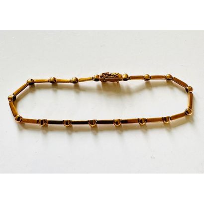 BRACELET with baguette links set with small...