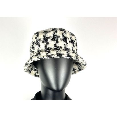 CHANEL. Bob in black and ivory wool-blend...