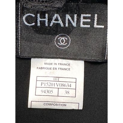 CHANEL. Evening jacket in black cotton lace...