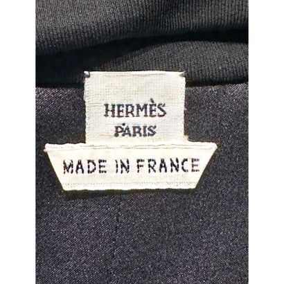 HERMES Paris. Sleeveless vest in black silk....