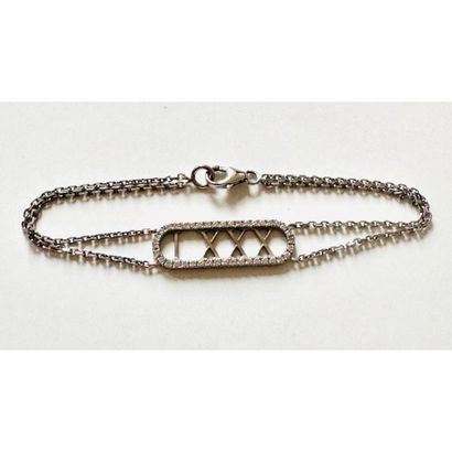 Double-row chain BRACELET adorned with a...